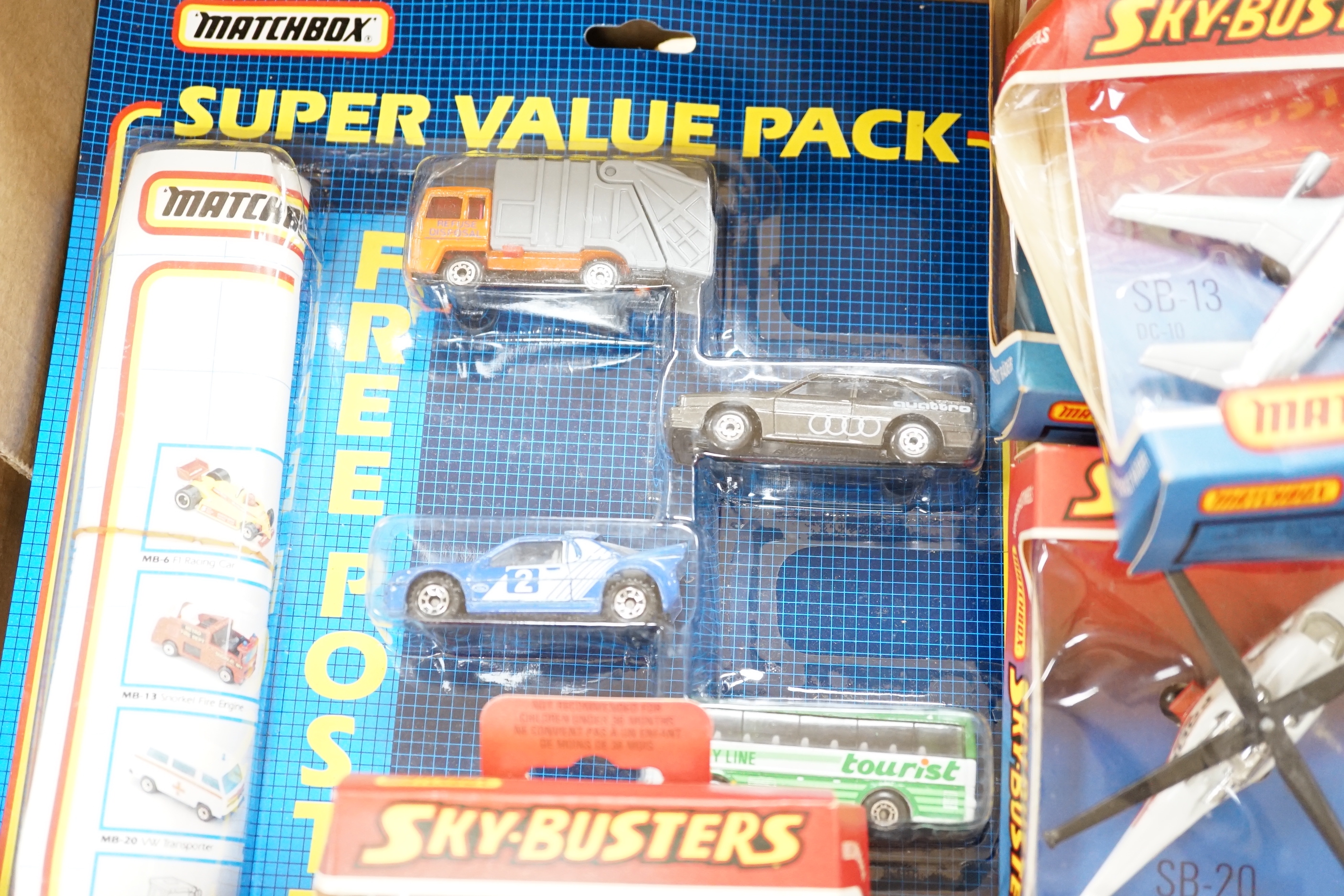 Thirty one boxed 1970s Matchbox Sky Busters diecast aircraft, together with two 1980s Matchbox ‘Super Value Packs’ of diecast vehicles